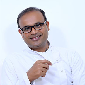 Best Orthodontist in Shivamogga in white coat